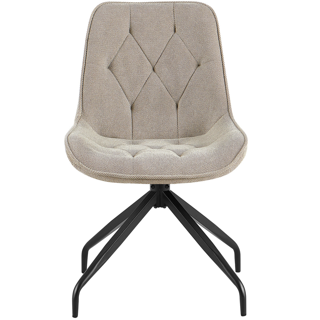 Framifrån av den stoppade stolen som kan roteras 360° i brunt med en svart metallram - elegant matsalsstol med diamantquiltning och en bekväm sittform